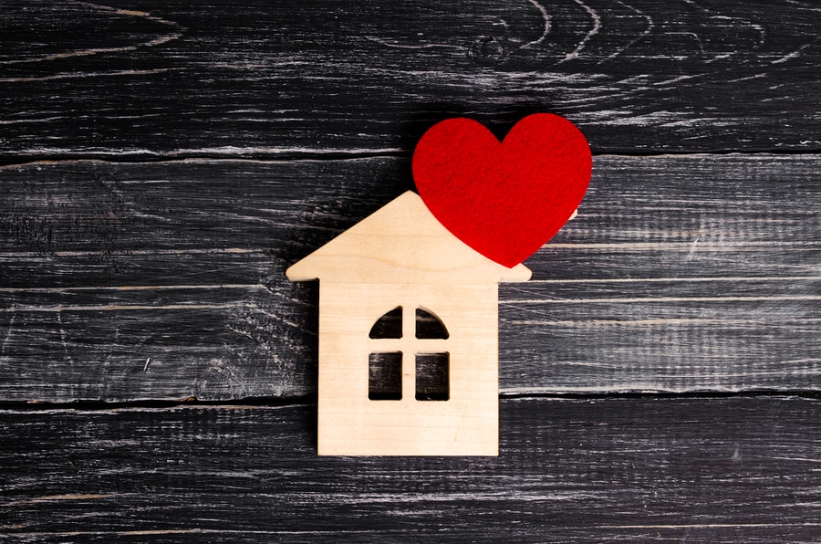 pt home health travel jobs-wooden house-red heart-wood background