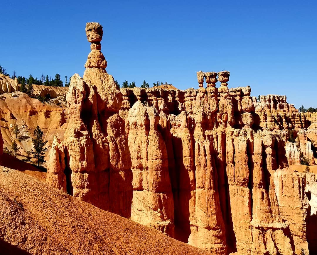 RN, May D., sitting across from Thor's Hammer at Bryce Canyon National Park.