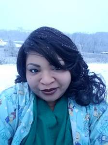 RN, Karyn E., enjoying a snowy day outside.